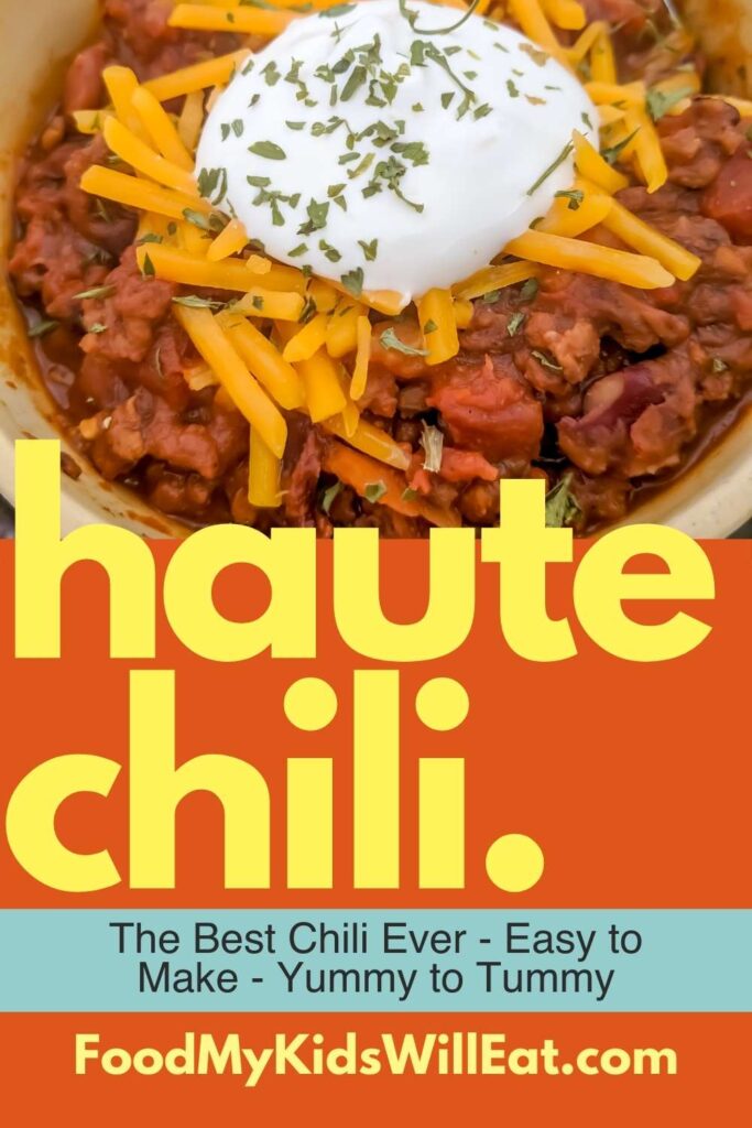 Haute Chili. Yummm. 7 Photo of chili topped with cheddar cheese and sour cream overlooking fall vibes.